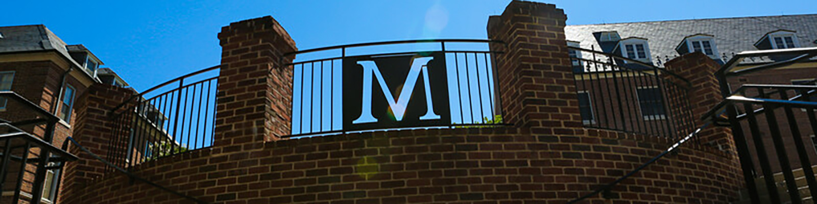 welcome terp sign and students in line